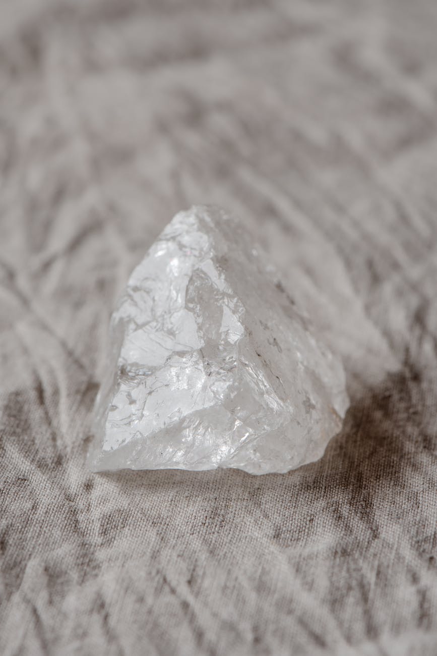 a clear quartz crystal with rough texture can be used for meditation and energy toward career success
